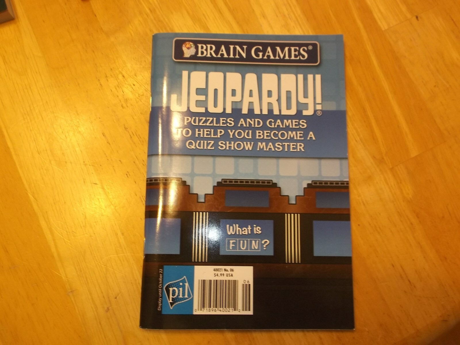 LOT OF 4( 2) FILL IN PUZZEL BXS,, JEOPARDY PUZZEL AND GAMES AND 1 COLOR BOOK